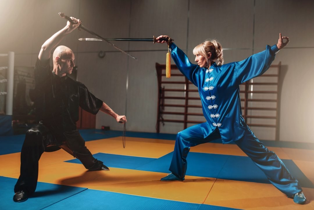 wushu fighters man and woman with swords.jpg